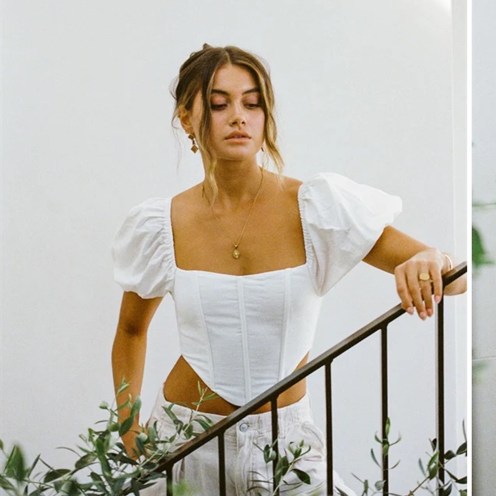 Sabo Skirt luxury line. Linen puff sleeve crop top with corset style body in XS
